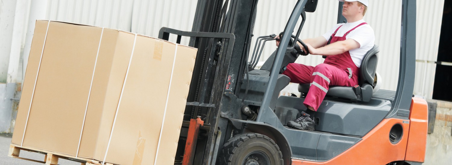 warehouse worker driver in forklift